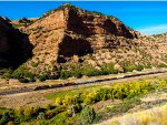 UP 8738 leads westbound manifest freight down Echo Canyon